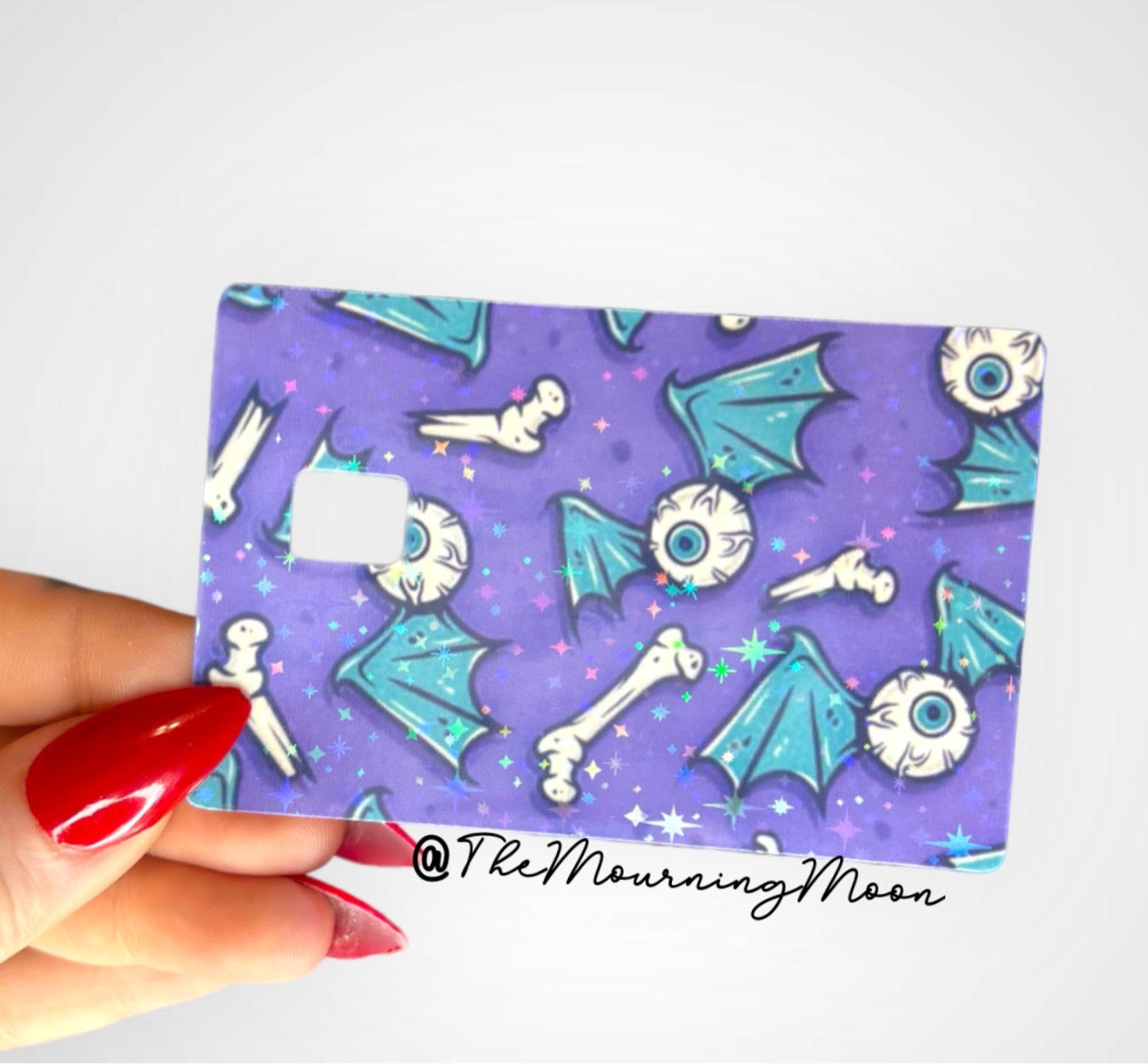 Winged eyeball credit card skin