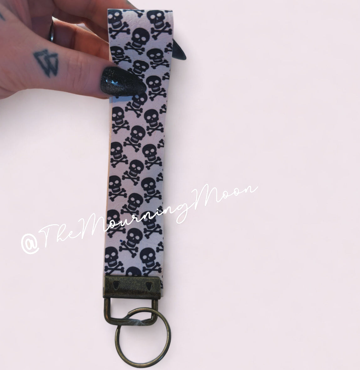Skulls faux leather wristlet