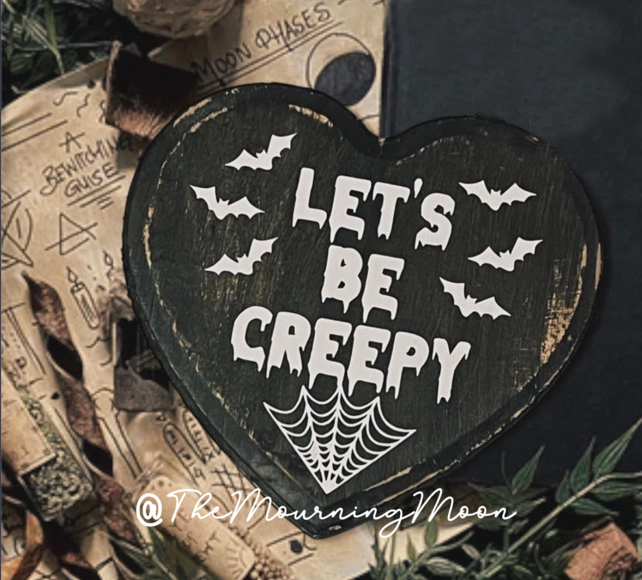 Let’s be creepy wooden sign