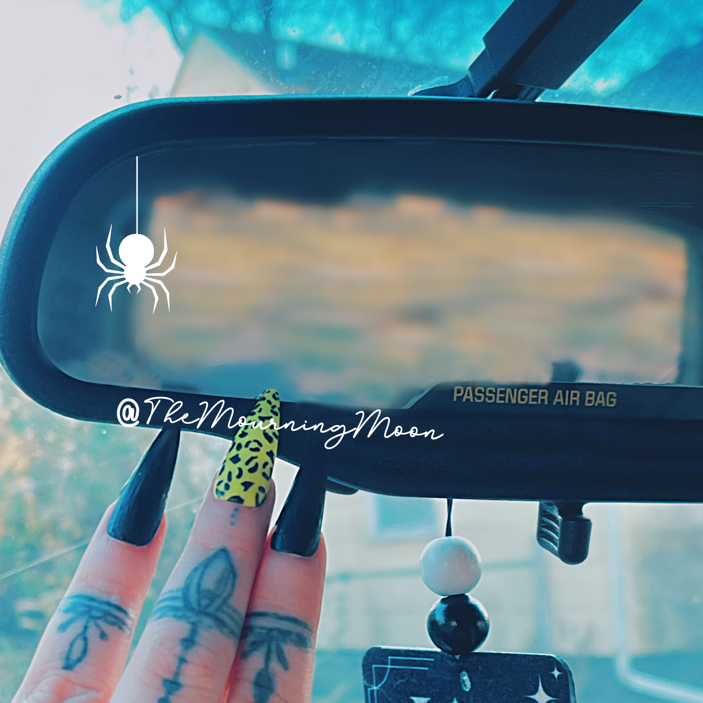 Rearview spider decal