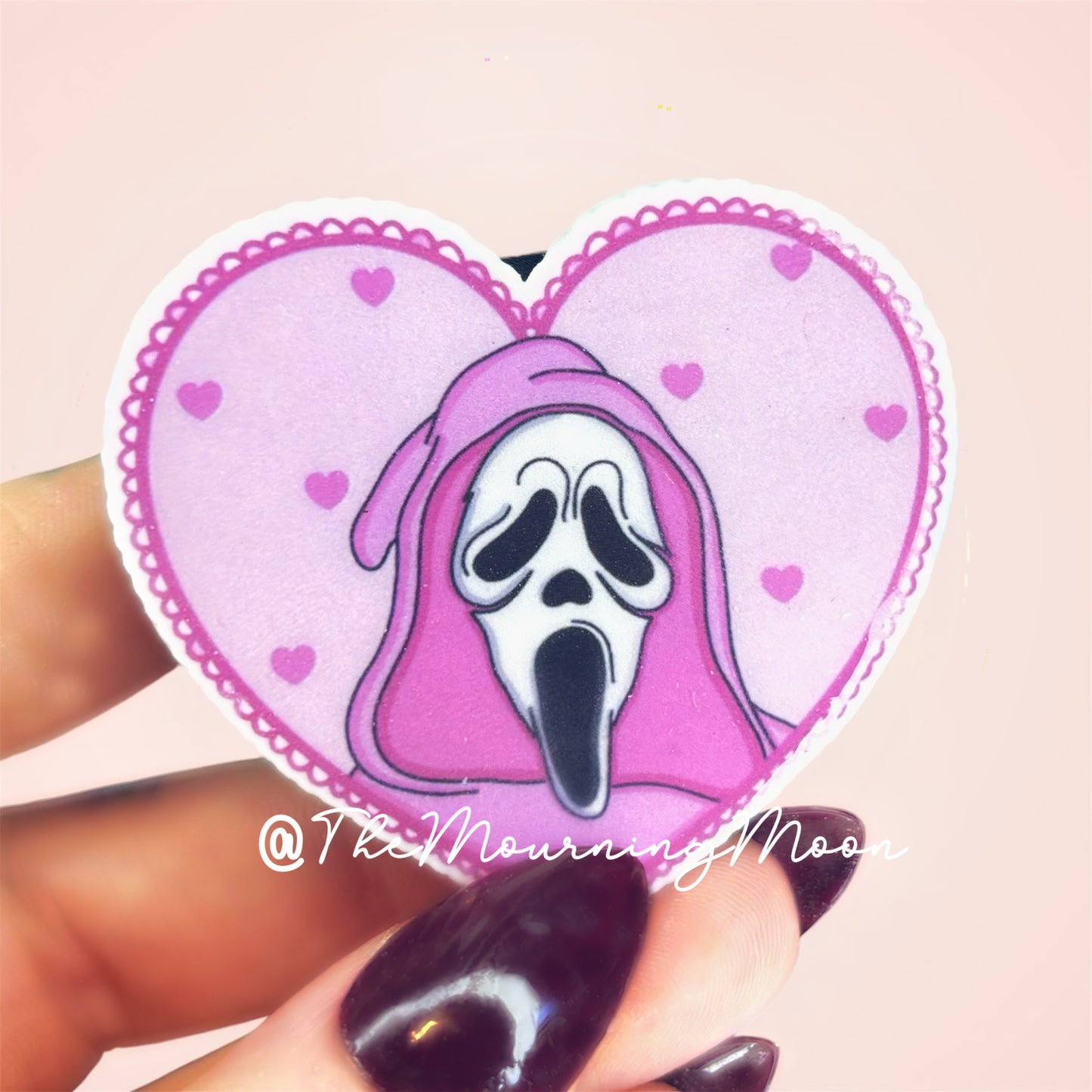 Pink ghost face heart phone grip