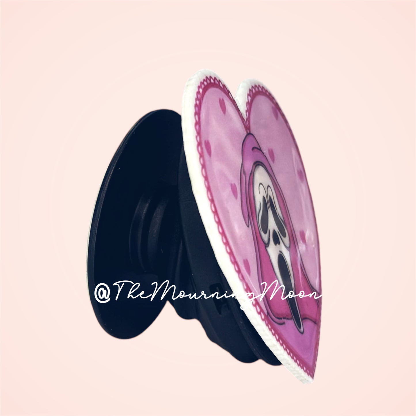 Pink ghost face heart phone grip