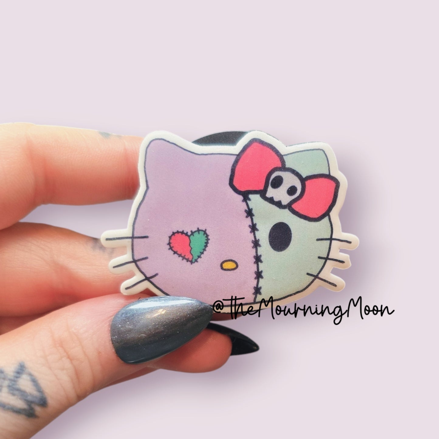 Zombie hello kitty shaped phone grip