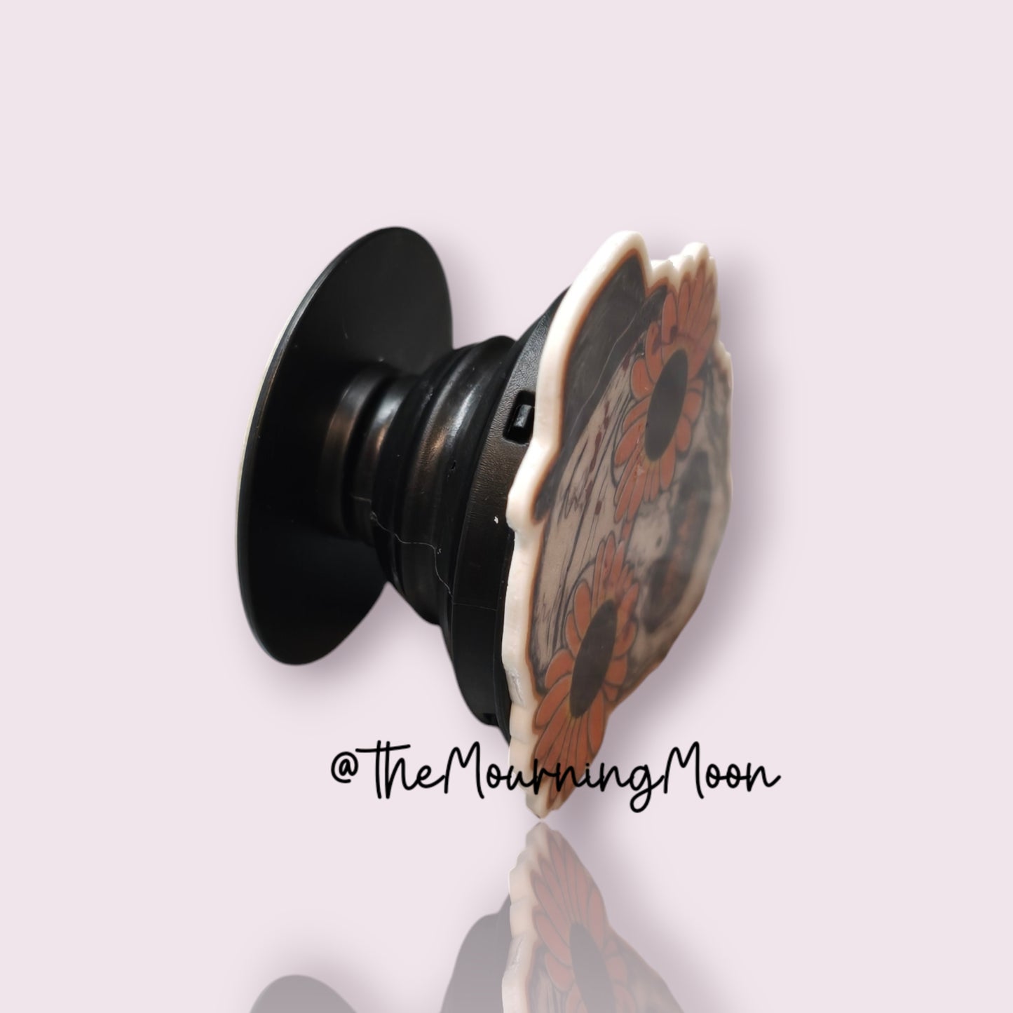 Art the clown shaped phone grip