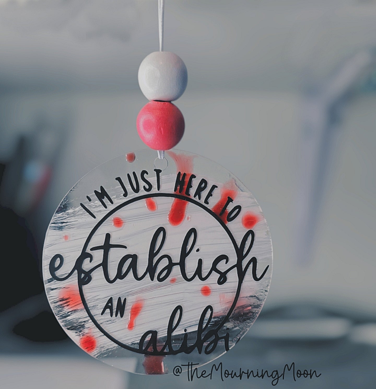 Just here for an alibi car charm